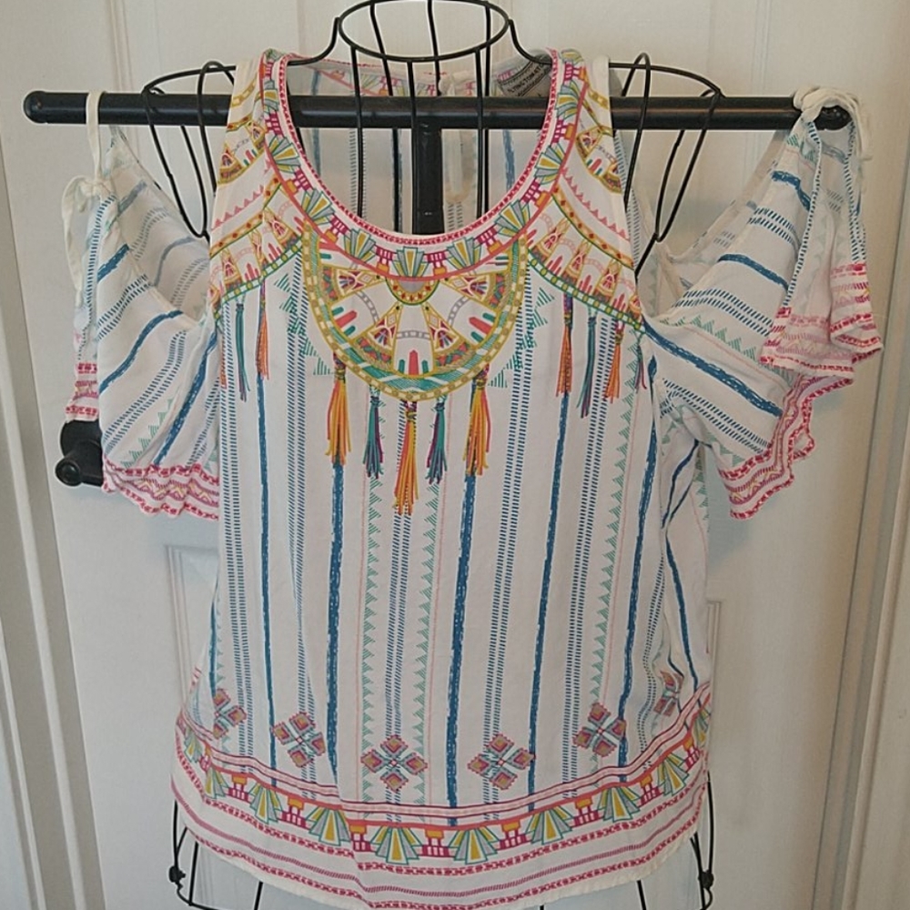 Cute multi color, ladies large pullover shirt.